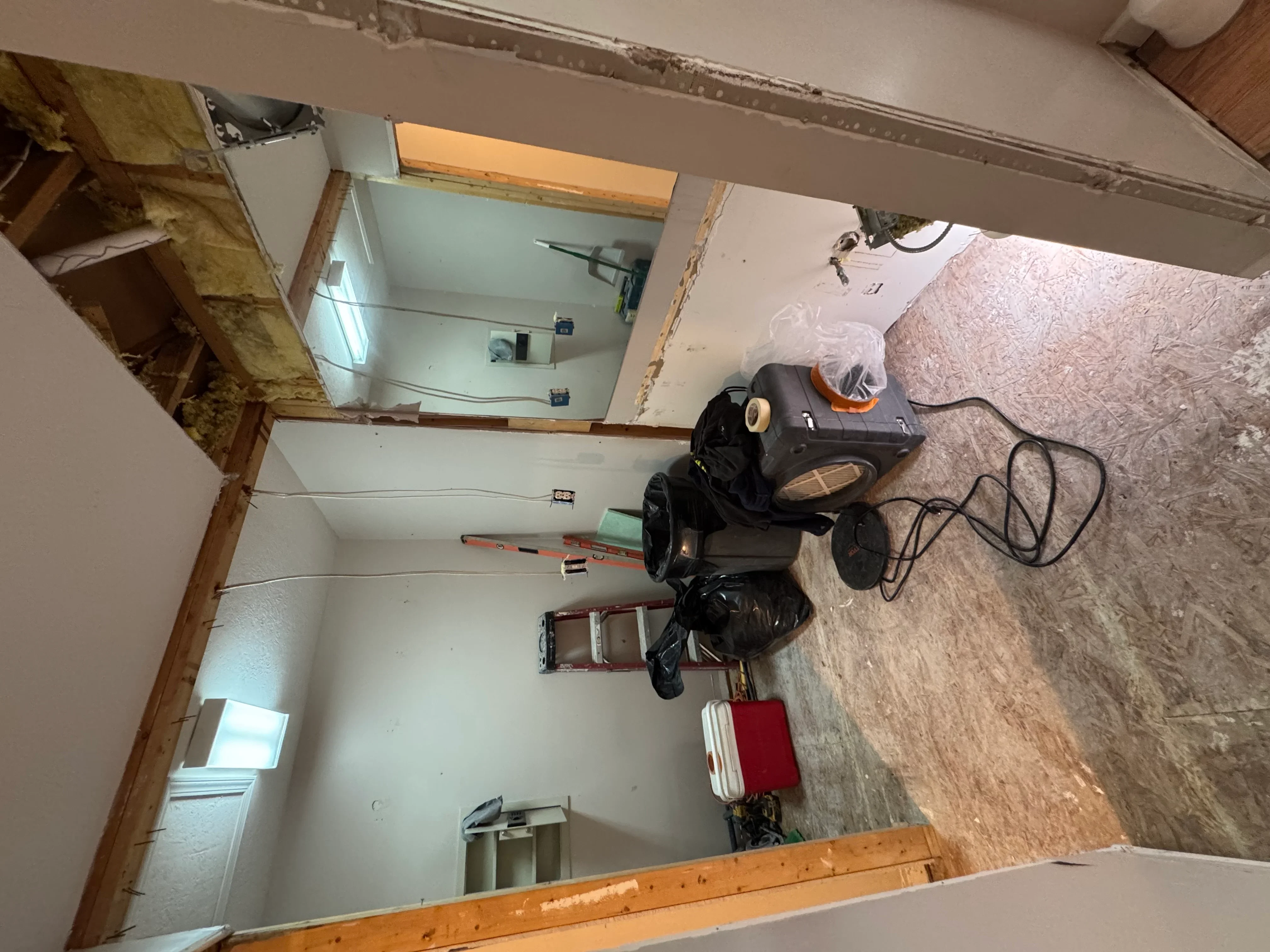 Bathroom renovation with drywall, electrical rough-in, and framing in progress